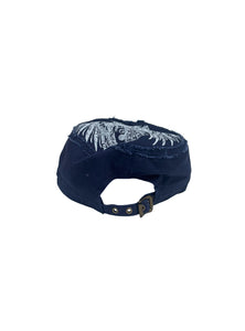 White Cap with a Sequined Hamsa Symbol