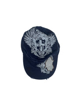 White Cap with a Sequined Hamsa Symbol
