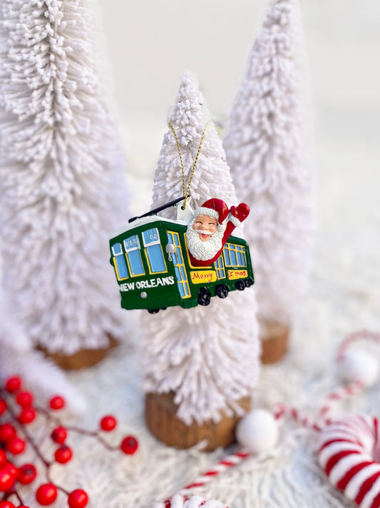 Ornement de père Noël en tramway