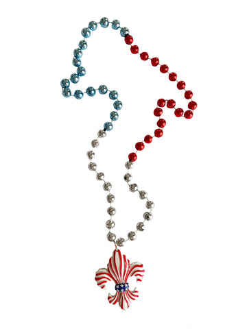 Fleur de lys patriotique rayée sur une perle fantaisie rouge, blanche et bleue