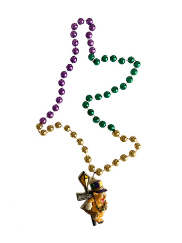 Cerdo de jazz de Bourbon Street sobre cuentas especiales moradas, verdes y doradas