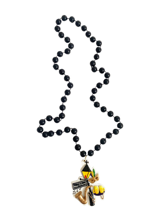 Médaillon icônes de Bourbon Street sur collier de perles noires spécial