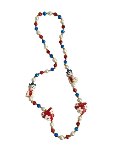 Perro con corazones en cuenta especial roja, blanca y azul