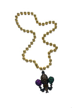 Black Fleur de Lis with Comedy Tragedy on a Gold Specialty Bead