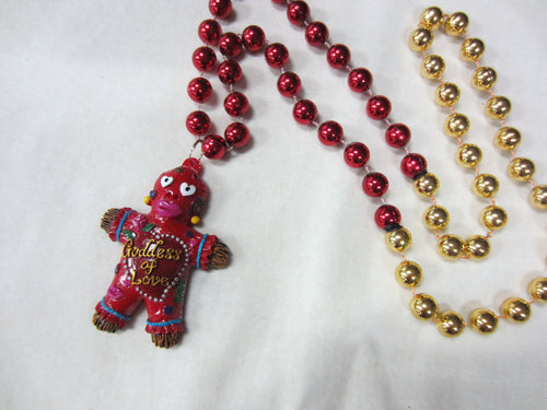 Goddess of Love Voodoo Medallion on a Red and Gold Specialty Bead
