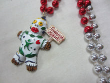 Goddess of Health Voodoo Medallion on a Red and Silver Specialty Bead