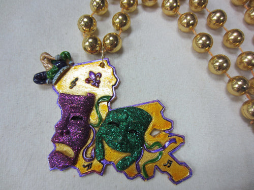 Glitter Comedy Tragedy on a Louisiana State Backdrop and Gold Specialty Beads