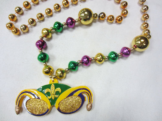 Lunettes de soleil Arlequin Pailletées sur des perles fantaisie violettes, vertes et dorées