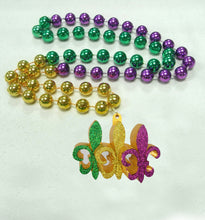 Purple Green Gold Trio of Fleur De Lis on a Purple Green Gold Specialty Beads